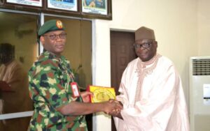 Brigadier-General Are handing over Army Sourvenir to Alhaji Garko shortly after the interactive session