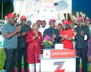 The Group Managing Director/CEO of Zenith Bank Plc, Dr. Ebenezer Onyeagwu (4th Left) flanked by the wife of the Founder and Chairman of Zenith Bank Plc, Mrs. Kay Ovia (3rd Left); Executive Director, Mr. Henry Oroh (1st Left); Executive Director, Dr. Temitope Fasoranti (2nd Left); Executive Director, Mrs Adobi Nwapa (2nd Right); and Executive Director, Mr. Akin Ogunranti (1st Right) at the 2023 Zenith Bank Christmas Light-Up of Ajose Adeogun Street, Victoria Island, Lagos at the weekend.