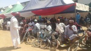 Some of the beneficiaries during the distribution of the palliatives at KASCO premises, Farm Centre on Monday