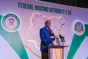 Keynote Speaker, Mr. Babatunde Fashola, SAN (right), delivering his address on the theme, “The Future of Housing in Nigeria and 50 Years of FHA: A Call to Action for Political Leaders and Policy Makers for Decent and Affordable Housing,” during the 50th Anniversary of the Federal Housing Authority at the Abuja International Conference Centre, Abuja, FCT on Thursday, 23rd November 2023.