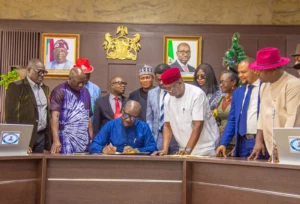 L-R: Secretary to the Edo State Government, Osarodion Ogie Esq.; Edo State Governor, Mr. Godwin Obaseki; Speaker of the Edo State House of Assembly, Hon Blessing Agbebaku, and Clerk of the State Assembly, Clerk of the Edo State House of Assembly, Alh. Audu Yahaya Omogbai, during the signing of the 2024 budget into law by the governor, at the Government House in Benin City, on Friday, December 22, 2023.