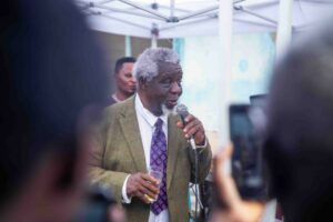 Reverend Kayode Soyinka singing old songs to the amusement of guests