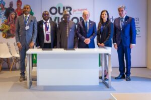 President Tinubu and others at the agreement signing ceremony