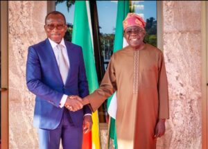 Presidents Bola Tinubu of Nigeria, right, and Patrice Talon of Benin Republic