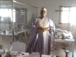 The Vice Chancellor , Prof. Abdullahi Bala, showcases some equipment at the Robotics laboratory
