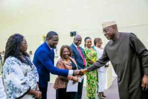 Governor Oyebanji , right, condratulationg the board members
