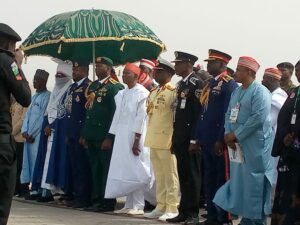Governor Yusuf flanked by security chiefs in Kano during the Armed Forces Remembrance Day