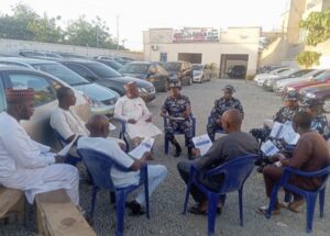 (Kiyawa---Kano Command image-maker discussing with motor vehicle owners and other stakeholders during the awareness campaign on Sunday, January 7, 2024