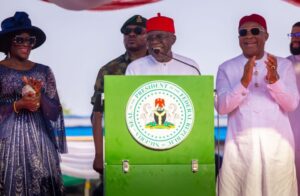 President Tinubu , centre, at the second-term inauguration of Governor Hope Uzodinma of Imo State, right, in Owerri, on Monday, 15 January 2024
