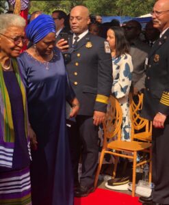 Former President Ellen Johnson-Sirleaf, left, arriving for the inauguration