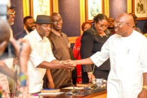 Governor Siminalayi Fubara in a handshake with returnee Commissioners on Friday