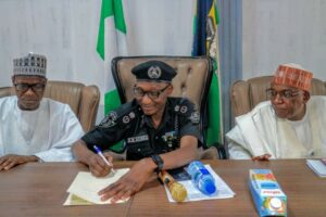 CP Gumel flanked by the state Director of DSS and Kano REC during the meeting at Police Officers' Mess, Bompai, Kano on Tuesday