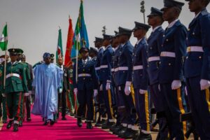 President Tinubu inspecting a guard of honour during the Diamond Jubilee of the Nigerian Defence Academy (NDA) in Kaduna