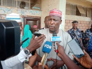 Doguwa speaking to journalists during the Townhall Meeting