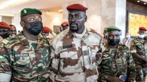 Junta Leader, Col Mamadi Doumbouya, center, surrounded by loyalists