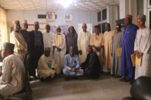 Members of the Committee on a group photograph after the inauguration