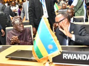 Presdents Bola Tinubu of Nigeria, left and Paul Kegame of Rwanda at the AU meeting
