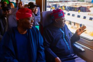President Bola Tinubu (right) and Governor of Lagos State, Mr. Babajide Sanwo-Olu in a train ride during the commissioning of the LMRT Red Line project in Lagos, on Thursday, 29 February, 2024