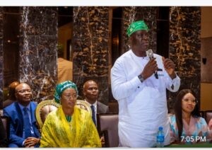 President of NIDO SL, Engineer Abiodun Oyebola, right, delivering his speech while Senator Oluremi Tinubu amd others listened with rapt attention