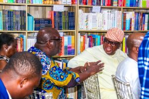 Sola Oshunkeye, second right, and other guests