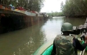 Soldiers on duty on surveillance on the creeks and mangroves of the Niger Delta