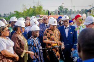 Vice President Shettima is keenly observed by Governor Otti (left), Mrs. Agatha Nnaji and Abia First Lady, Mrs. Priscilla Otti, as he switches on the plant.