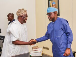 Governor Oyebanji, right, during the swearing in a former Permanent Secretary in the Ekiti State Civil Service, Mr James Folorunso as Director General/ Special Adviser Bureau of Public Procurement