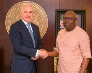 Governor Siminalayi Fubara in handshake with Mr Thomas Schlesinger, Austrian Ambassador to Nigeria