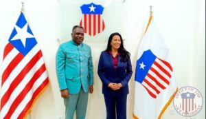 Liberia’s VP Jeremiah Koung, left, with IFC West & Central Africa Director, Madam Dahila Khalifa in Monrovia yesterday