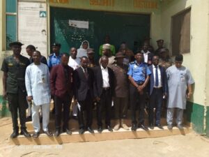 Members of the Kano PDSS Advisory Committee in a group photograph with CP Gumel