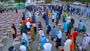 Staff of Kano Government House picking their Ramadan gifts from Governor Yusuf at the Open Theatre, Kano Government House on Sunday