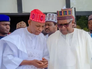 File photo. Governor Kabir Yusuf, left, and Aliko Dangote