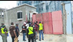 Lagos officials carying out enforcements against people who contravened building regulations