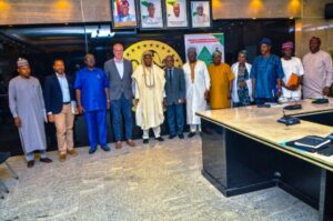 Mr. Mathias and Gwarzo durung the visit at the Ministry of Housing and Urban Development in Abuja on Thursday
