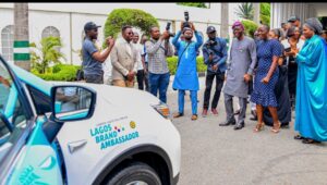 from right: Chairman/CEO, Nigerians in Diaspora Commission (NiDCOM), Hon. Abike Dabiri-Erewa; London-Lagos solo driver, Ms. Pelumi Nubi and Governor of Lagos State, Mr. Babajide Sanwo-Olu at presentation of car gift to Ms. Nubi during her meeting with the governor, at the Lagos House, Marina, on Monday, 08 April 2024.