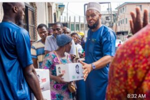 Tinubu Youths Support group distributing the items