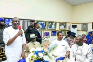 Rivers State Governor, Sir Siminalayi Fubara (left); addressing Ndoni people during a reception in his honour at the country home of former Governor, Dr Peter Odili (seated 2nd left); after commissioning the Comprehensive Primary Health Centre in Ndoni Town, Ogba/Egbema/Ndoni Local Government Area, last Thursday. Senator Lee Meaba (2nd right); Chief David Briggs (right); and others listen
