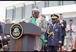 President Boakai, reading his inauguration speech, 100 days ago