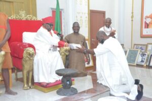 Mr Olugbile Holloway handed over the repatraited objects to Oba Ewuare11