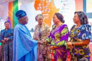 President Tinubu, left, at the occasion