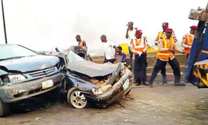 Road safety officials at the scene of road accident