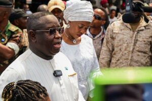 President Bio taking his oath of office 1 year ago on 24 June 2023. On the right is First Lady, Fatima Bio