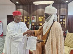 Aliyu Abdulkadir Gaya receiving his appointment letter from Governor Yusuf.jpg