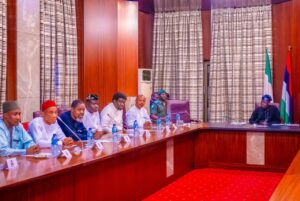 President Tinubu, right, with the Labour leaders.jpg