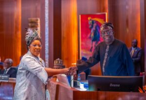 President Bola Tinubu congratulating Mrs Esther Didi Walson-Jack, the New Head of Service.jpg