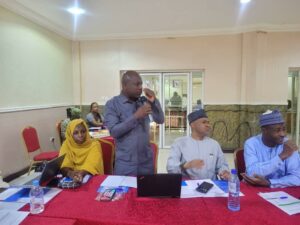 Standing is Oluniyi of UNICEF and resource persons during the meeting.jpg