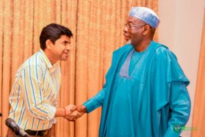 Mr. Sidlan in a warm handshake with Governor Namadi.jpg
