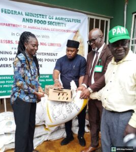 One of the beneficiaries receiving her package.jpg