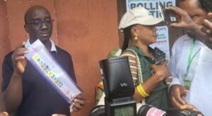 Senator Monday Okpebholo casting his vote on Saturday.jpg