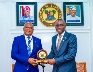President, Chartered Institute of Bankers of Nigeria (CIBN), Prof. Pius Olanrewaju receiving Lagos State Government plaque from the Governor, Mr. Babajide Sanwo-Olu during a courtesy call by the governing council of CIBN at the Lagos House, Marina, on Wednesday, 18 September 2024